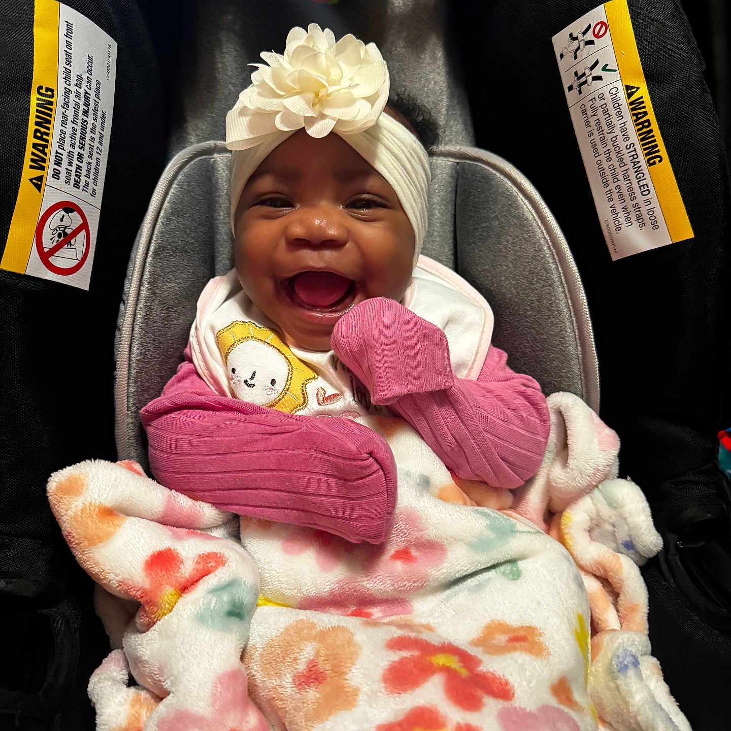 Myalinn joined the competition — help win amazing prizes! baby, child, car_seat, blanket, flower_headband, mittens, smile, happy, infant, toy, warning_label, clothing, seat, indoor, portrait, cute, colorful, baby_accessory, baby_girl, wrapped