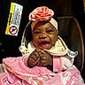 baby, smiling, pink_blanket, headband, flower, car_seat, infant, happy, child, clothing, pacifier, blanket, cute, portrait, indoors, hand, face, baby_girl, warm, cozy