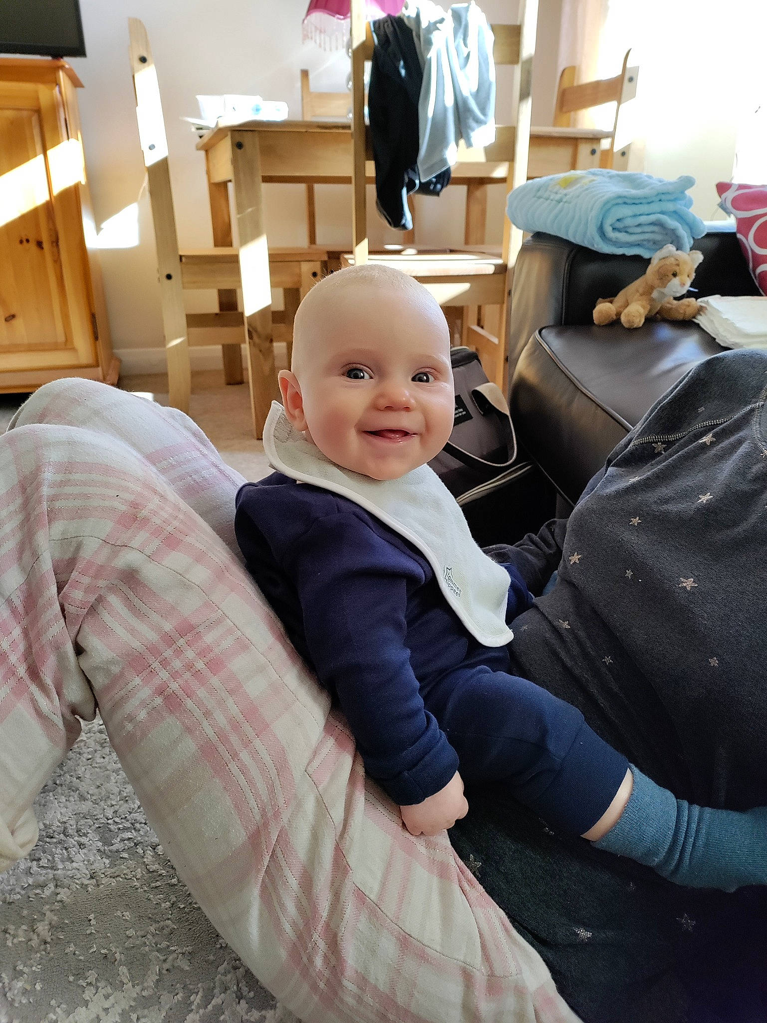 Sonny joined the competition — help win amazing prizes! baby, baby_toddler_clothing, chair, child, comfort, drawer, floor, flooring, fun, happy, joy, lamp, lap, living_room, person, room, sitting, smile, sock, suit