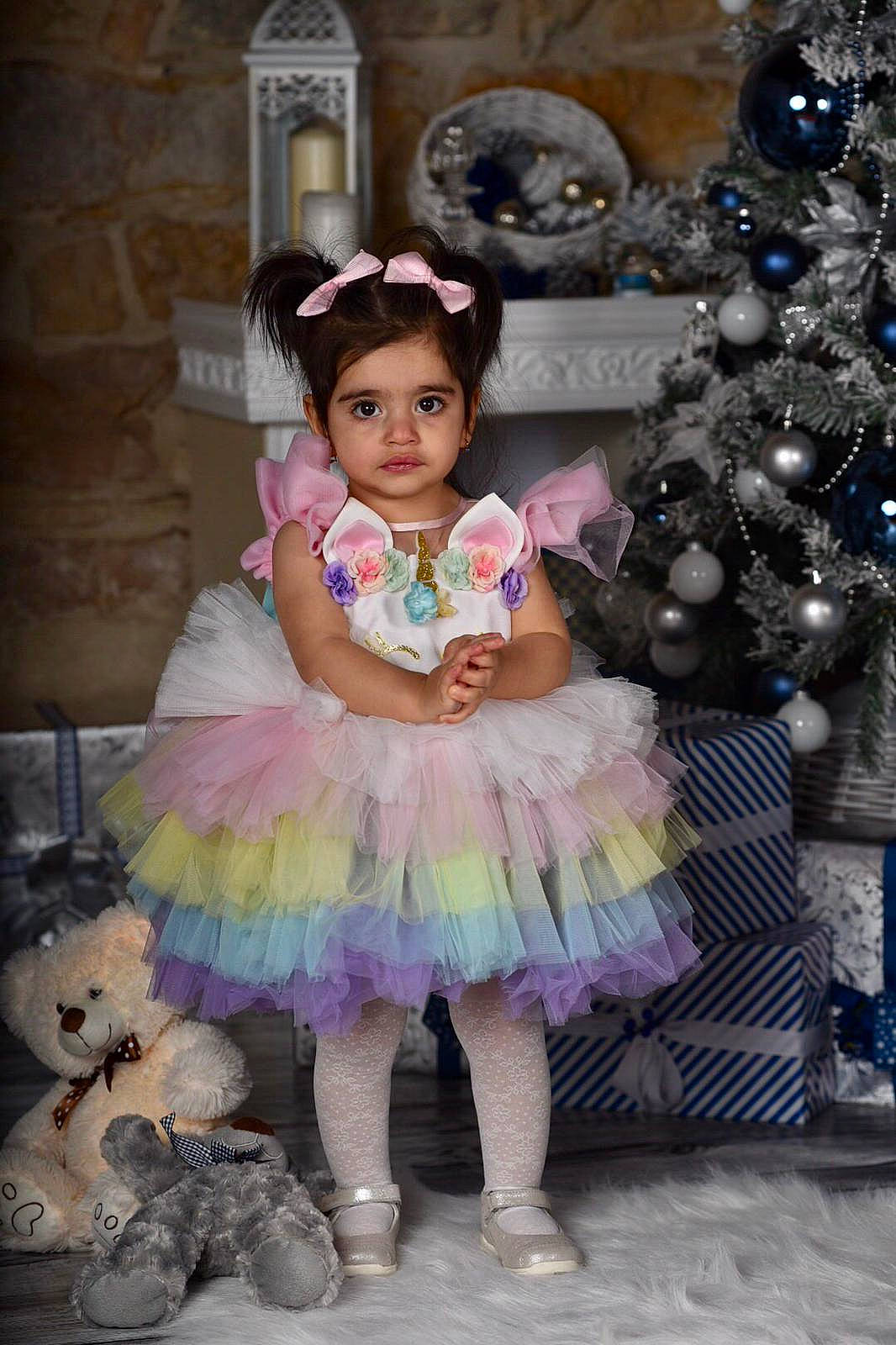 Gabriella a rejoint le concours — aidez-le/la à gagner de superbes lots ! baby_toddler_clothing, beauty, child, costume, embellishment, event, fashion_accessory, fashion_design, fun, happy, headpiece, iris, magenta, pattern, person, pink, purple, ruffle, toddler, violet