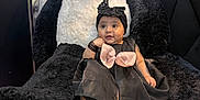 Anzal joined the competition — help win amazing prizes! baby, child, plush, panda, stuffed_animal, black_dress, headband, pink_bow, bracelet, cute, indoor, floor, seated, portrait, infant, toy, soft_toy, comfort, happy, adorable