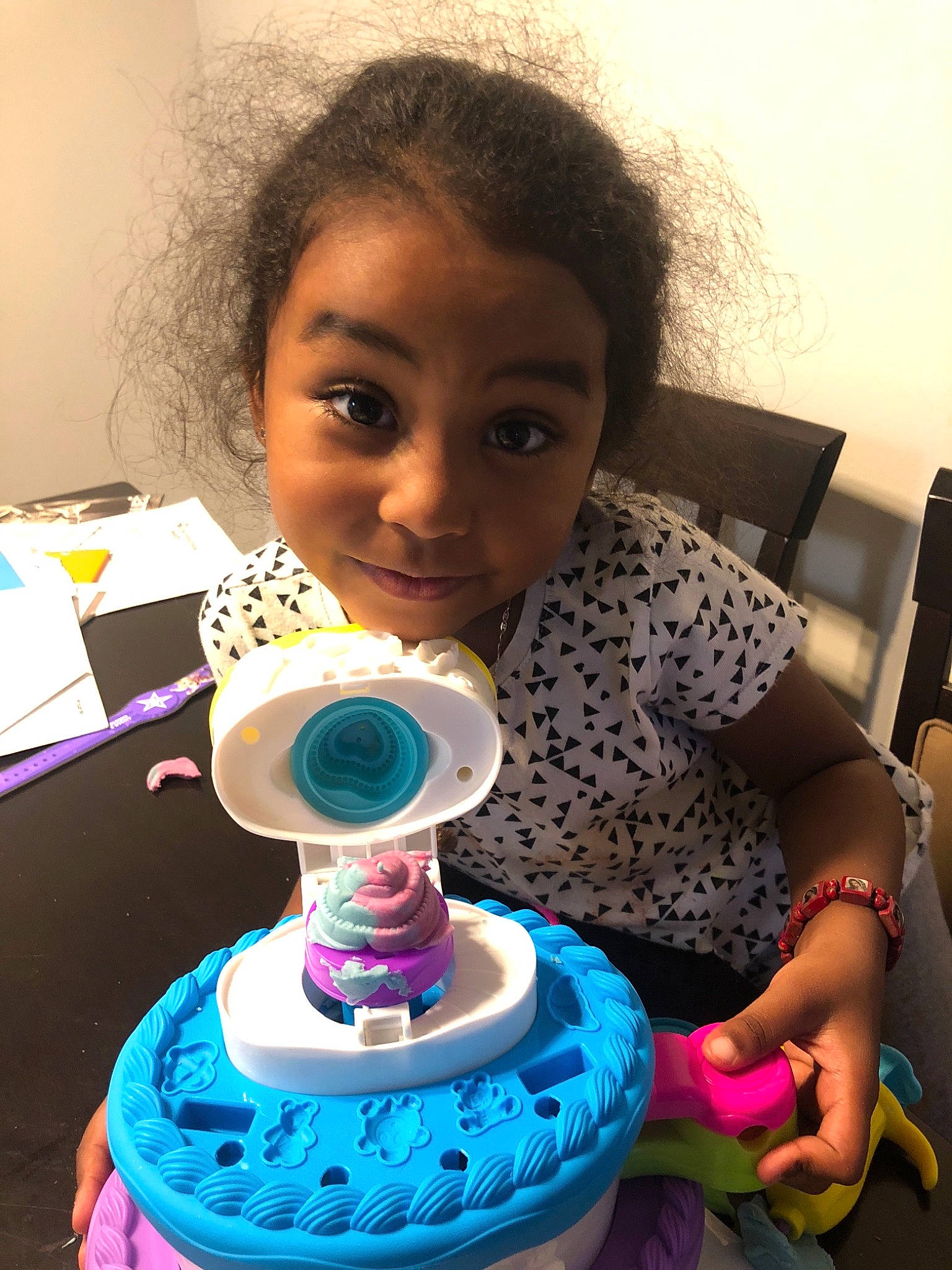 Nayellie is registered to the contest to win money with this photo: cake, cake_decorating, child, fun, girl, hair_coloring, person, pink, product, purple, skin, smile, toddler