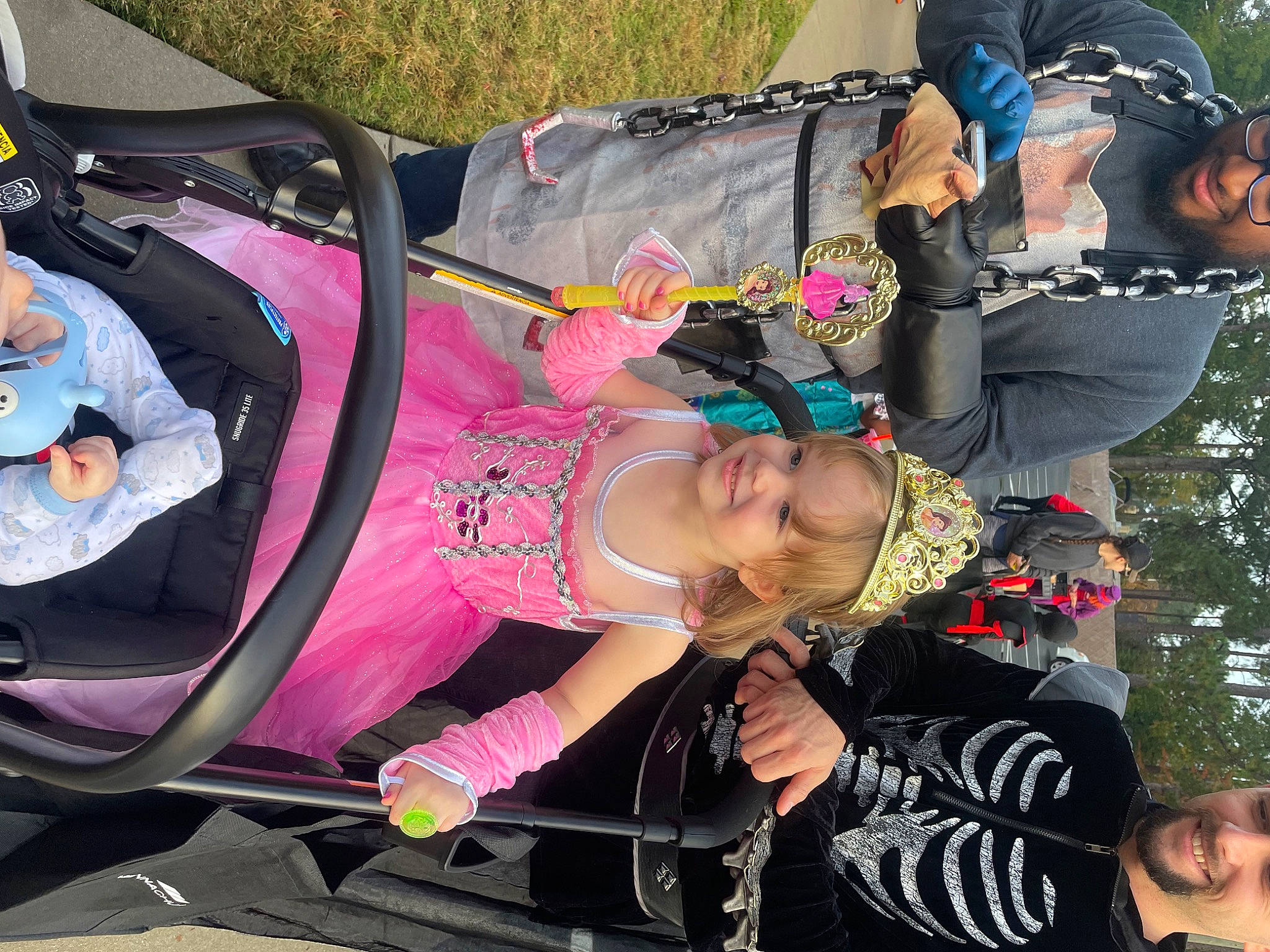 Evelyn joined the competition — help win amazing prizes! auto_part, baby_carriage, baby_products, child, event, festival, fun, headwear, joy, leisure, magenta, person, pink, product, public_event, recreation, tire, toddler, tree, wheel