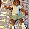 Denim is registered to the contest to win money with this photo: baby, infant, blanket, pacifier, clothing, shorts, white_shirt, socks, lying_down, indoor, cute, child, person, comfort, relaxation, soft_texture, sleepwear, young, face, hands