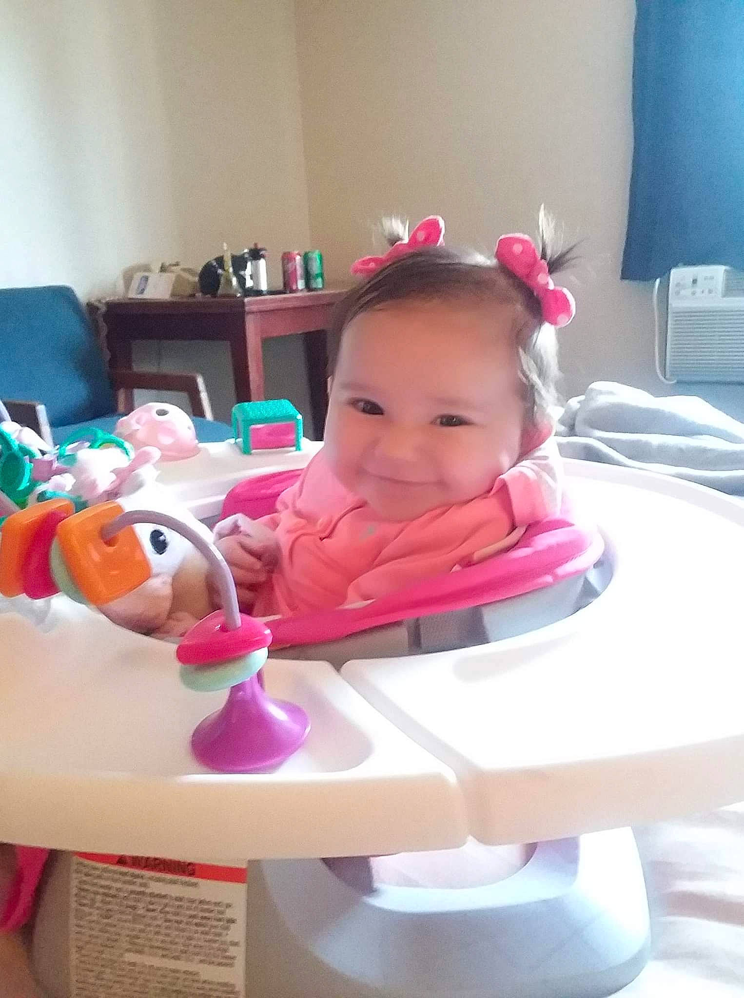 Danica joined the competition — help win amazing prizes! audio_equipment, baby, baby_products, baby_toys, carmine, child, drinkware, eyelash, face, fun, happy, head, magenta, person, personal_protective_equipment, pink, plastic, sitting, toddler, toy