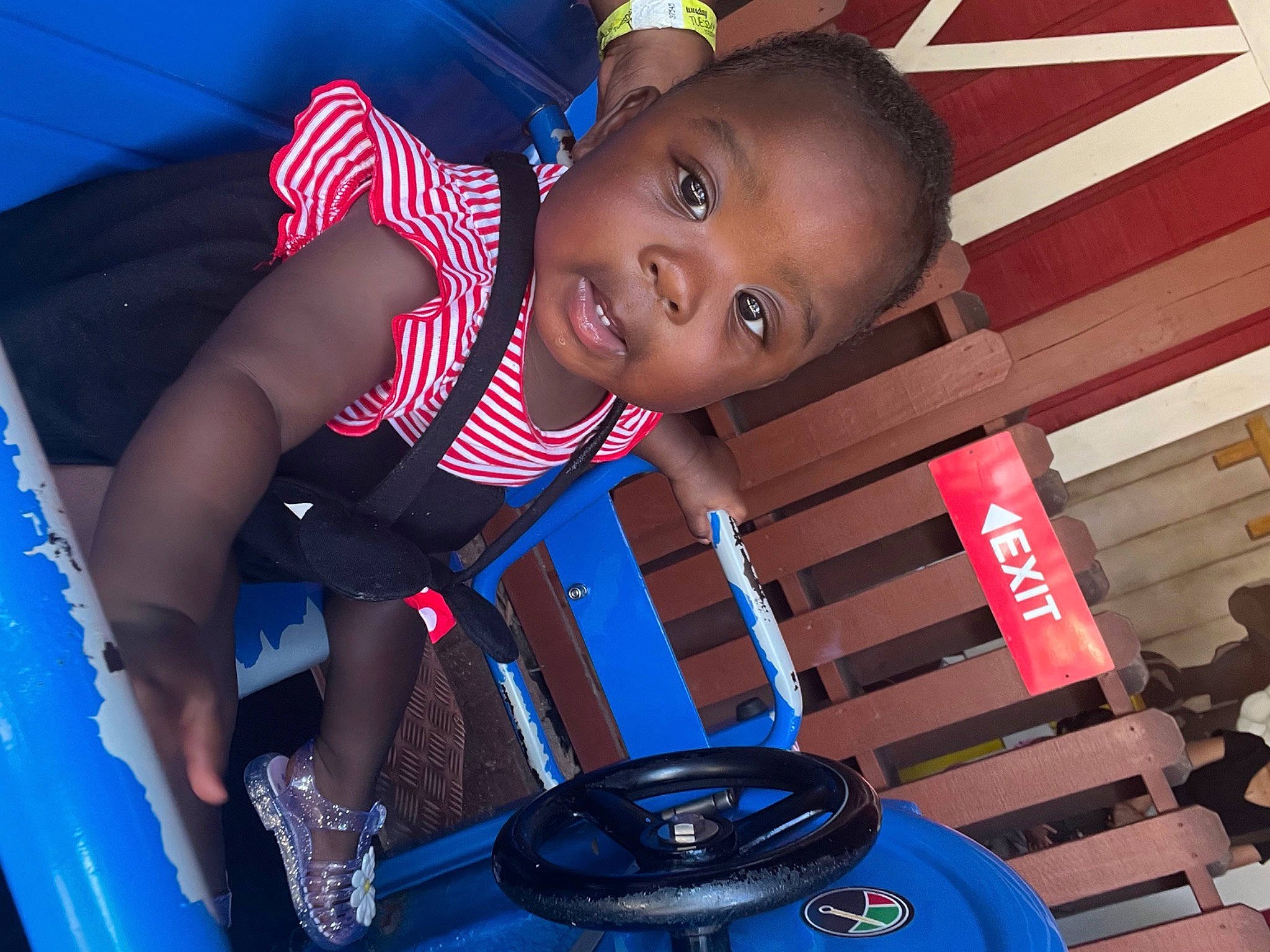 Nielley joined the competition — help win amazing prizes! audio_equipment, automotive_tire, blue, child, electric_blue, fun, happy, hat, leisure, pattern, person, personal_protective_equipment, play, product, recreation, red, smile, t_shirt, thigh, toddler