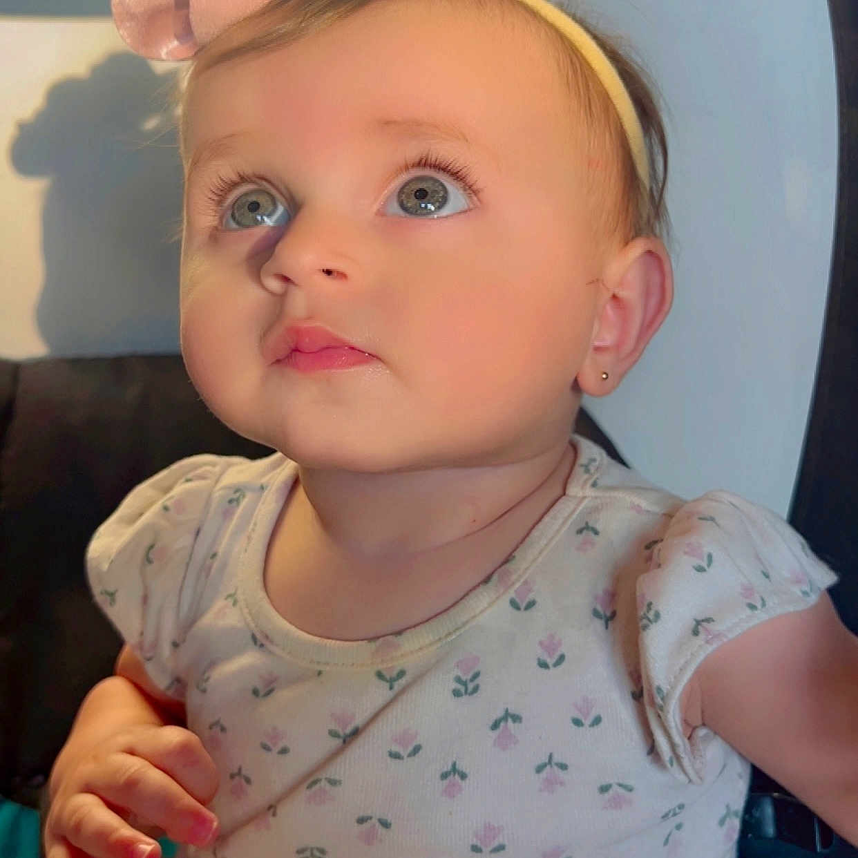 Seela joined the competition — help win amazing prizes! adorable, baby, blue_eyes, bow, child, cute, earring, expression, face, floral_pattern, girl, headband, indoors, infant, pink, portrait, shirt, sitting, skin, soft_light