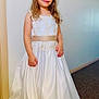 Ola joined the competition — help win amazing prizes! child, girl, princess, dress, gown, tiara, smile, long_hair, standing, indoor, carpet, wall, portrait, formal_wear, young, cute, fashion, elegant, happy, person