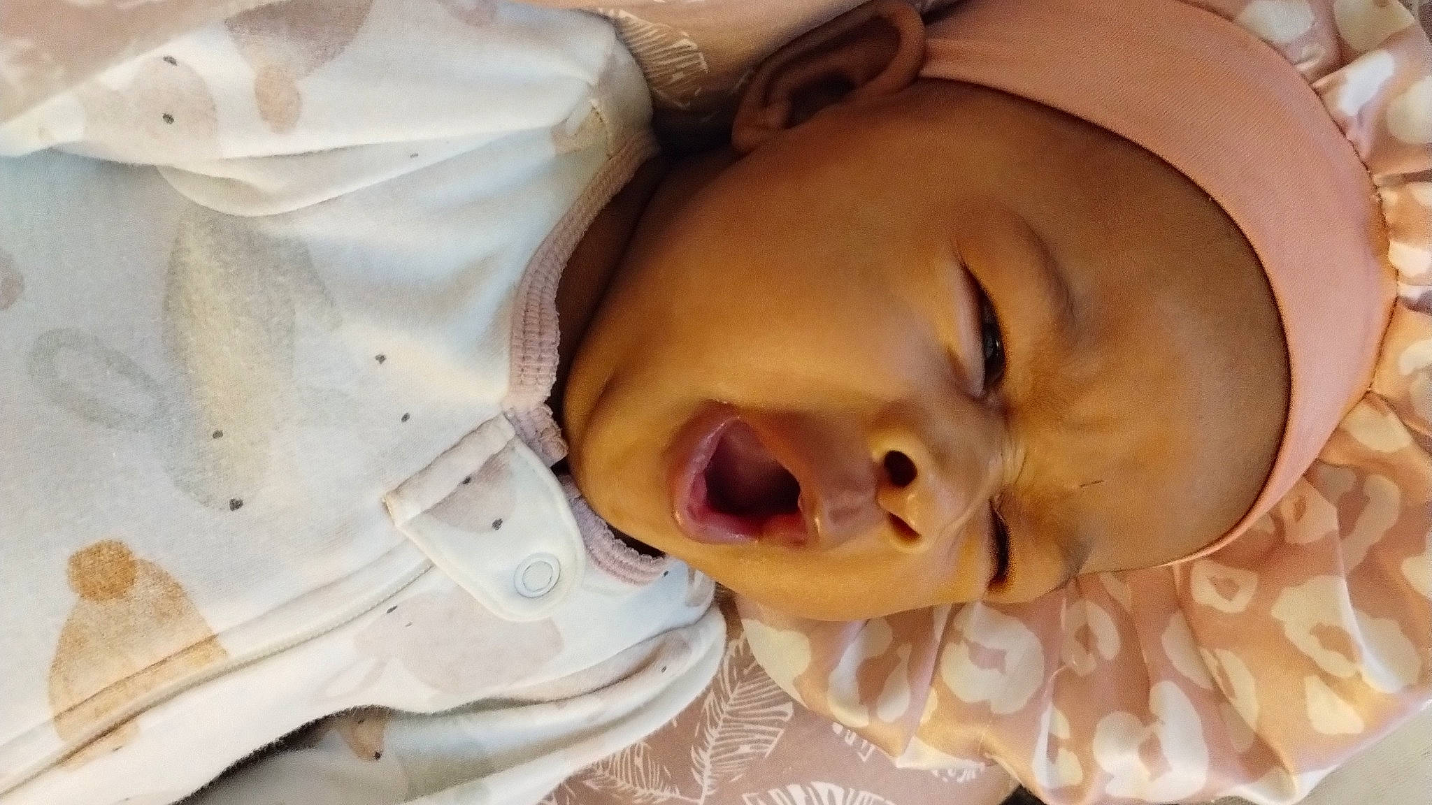 Jupiter is registered to the contest to win money with this photo: baby, bedtime, cheek, child, chin, comfort, ear, eyebrow, eyelash, gesture, happy, headgear, jaw, lip, mouth, neck, nose, person, skin, sleeve