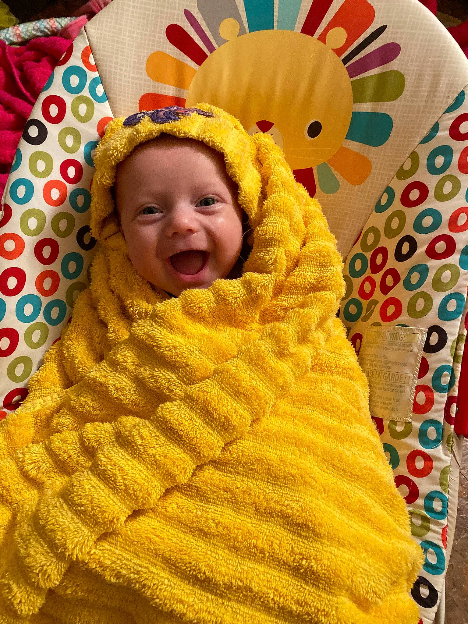 Melanie Trisha Rose is registered to the contest to win money with this photo: baby, child, outerwear, person, smile, textile, toddler, wool, yellow