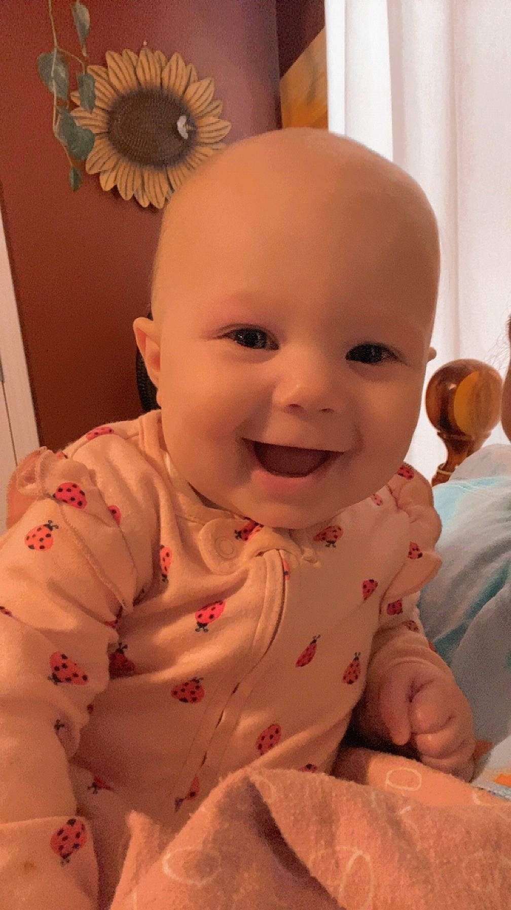 Kennedy is registered to the contest to win money with this photo: baby, baby_laughing, baby_toddler_clothing, cheek, child, chin, eye, eyelash, flooring, fun, happy, iris, joy, lip, mouth, nose, person, pink, skin, sleeve