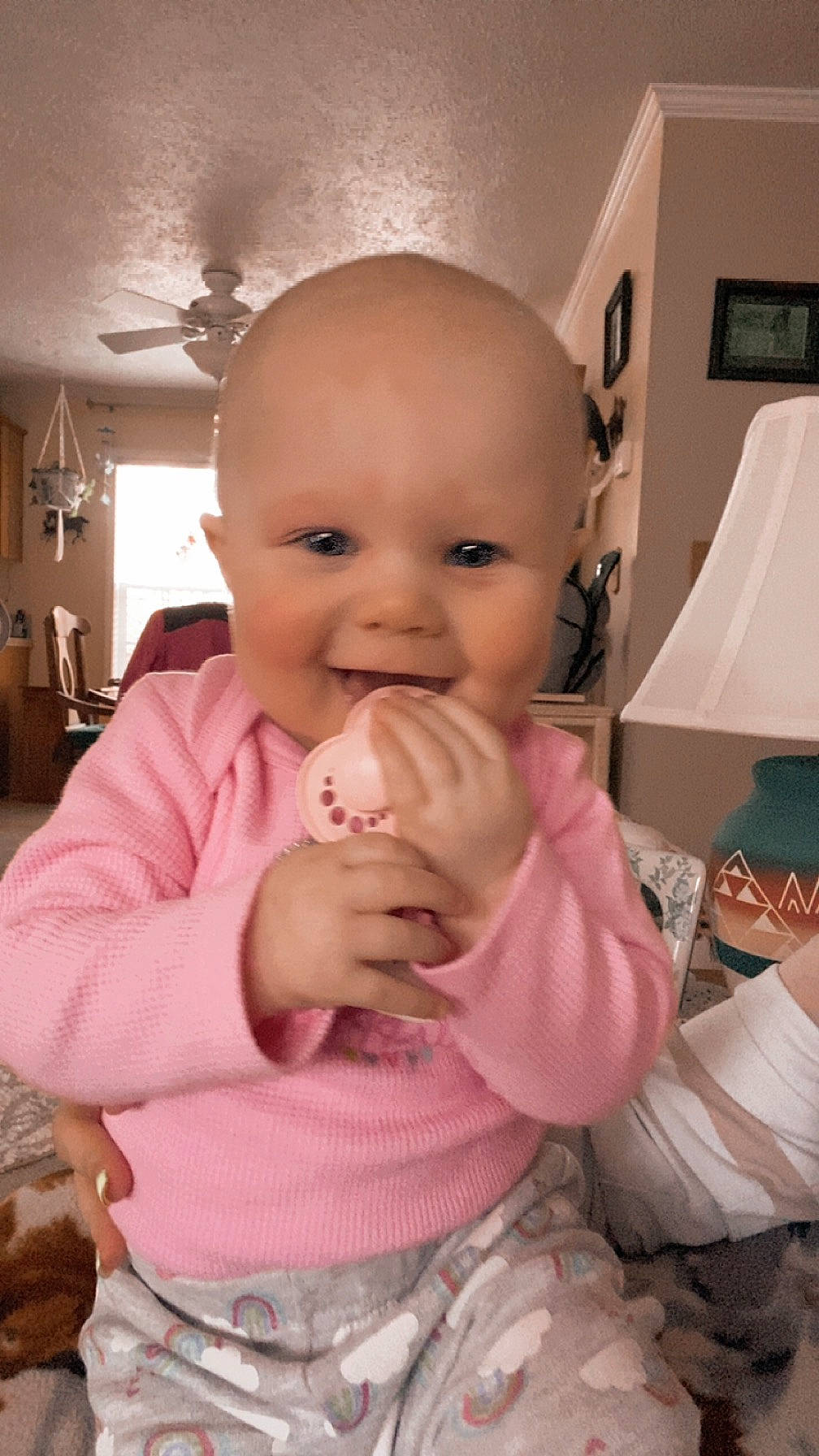 Kennedy joined the competition — help win amazing prizes! baby, baby_toddler_clothing, cheek, chin, comfort, flooring, gesture, happy, human_body, lamp, lip, mouth, nail, nose, person, pink, skin, sleeve, smile, thumb