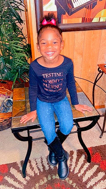 Azaria is registered to the contest to win money with this photo: ankle, baby_toddler_clothing, child_model, denim, hair_accessory, headband, houseplant, jeans, joy, knee, lap, laugh, mouth, person, sock, trousers