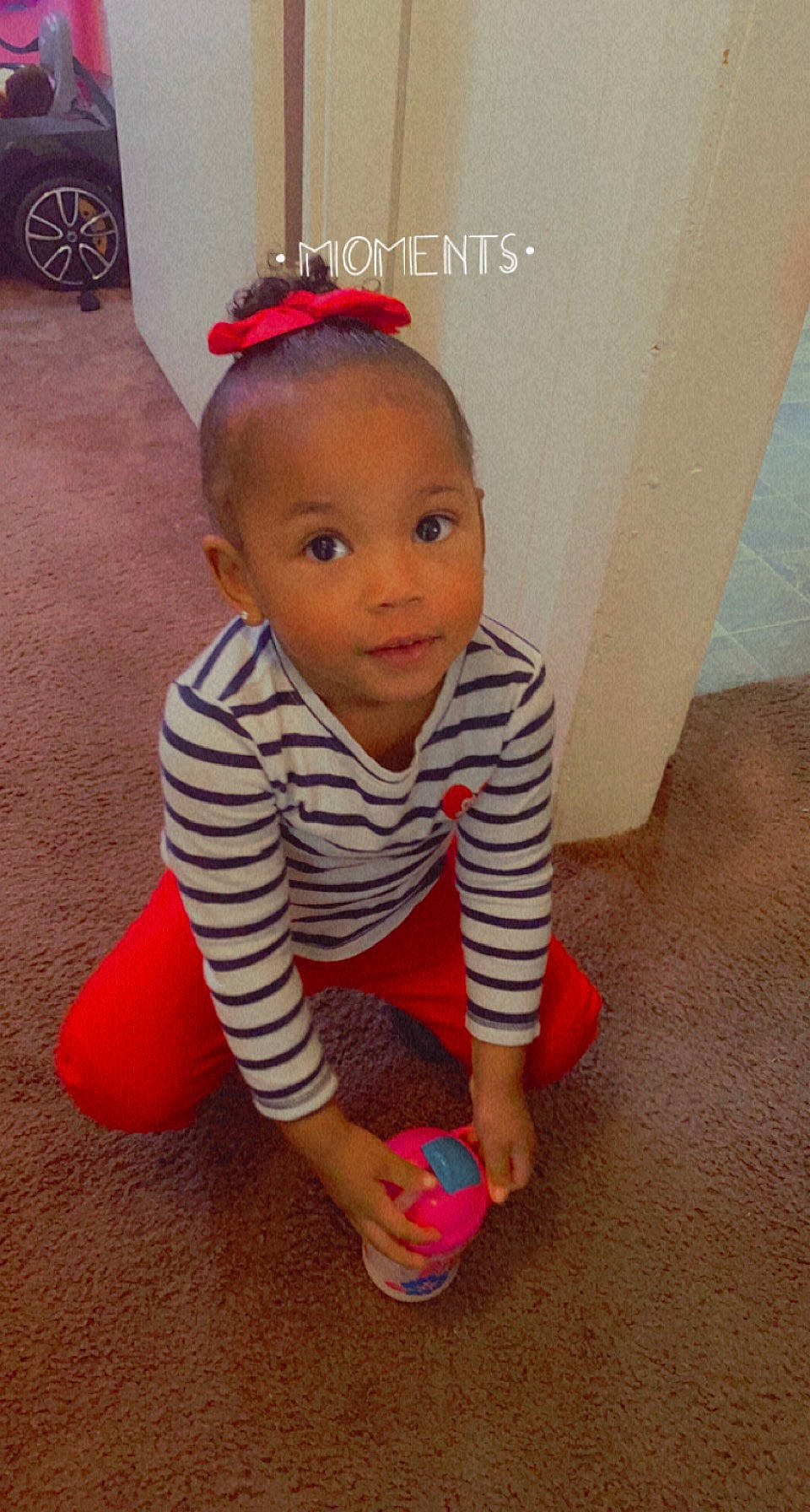 Aubree joined the competition — help win amazing prizes! alloy_wheel, baby, baby_toddler_clothing, child, crawling, ear, floor, flooring, foot, hair_accessory, headband, headpiece, hubcap, human_body, long_sleeved_t_shirt, person, pink, play, red, toddler