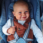 Eden participe au concours pour gagner de l'argent avec cette photo : baby, baby_boy, baby_clothes, blue_eyes, brown_clothing, child, closeup, comfortable, corduroy, cute, face, hand, happy, infant, portrait, seatbelt, sitting, smiling, stroller, white_shirt