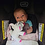 baby, blanket, car_seat, child, clothing, comfort, cozy, cute, fabric, indoor, infant, newborn, pacifier, plush_toy, portrait, seatbelt, sitting, soft_toy, unicorn, warning_label