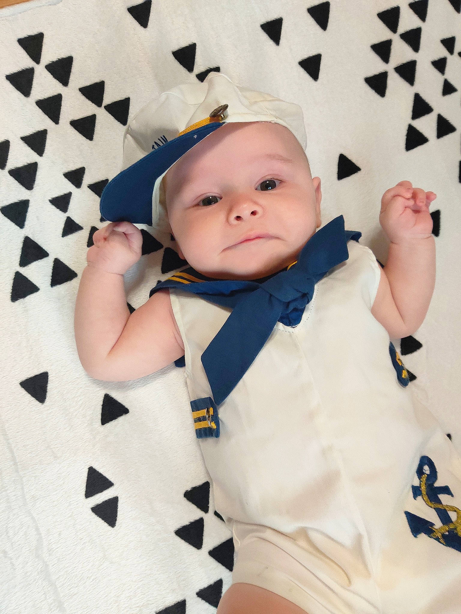 Bobby joined the competition — help win amazing prizes! baby, baby_products, baby_safety, baby_toddler_clothing, child, collar, dress_shirt, fashion_accessory, finger, gesture, happy, headwear, outerwear, pattern, person, sitting, skin, sleeve, textile, thumb