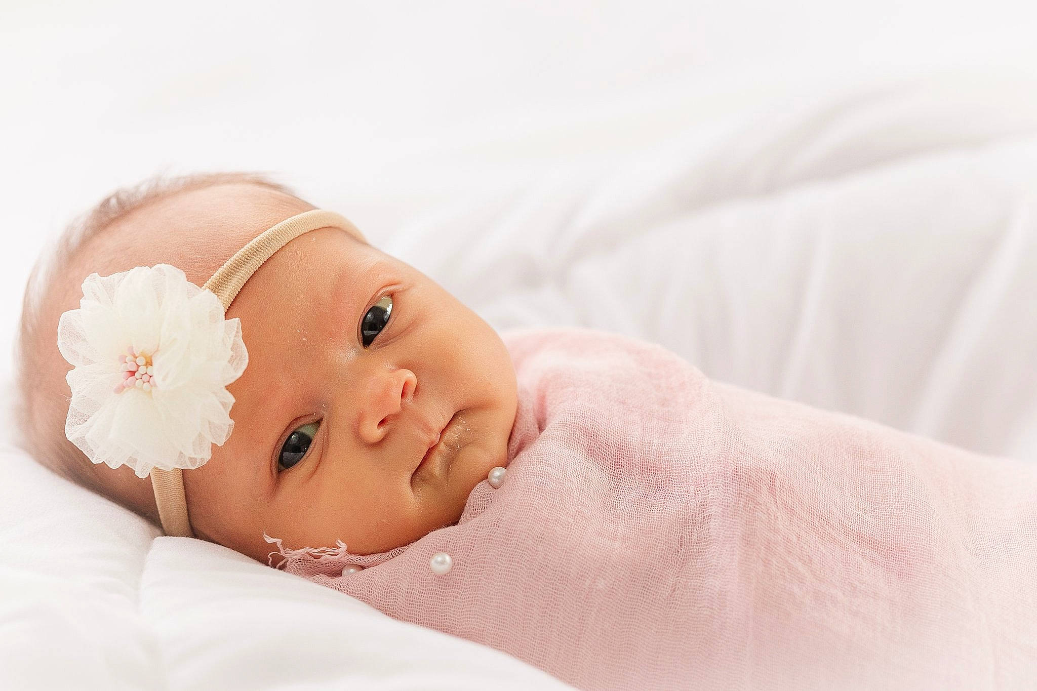 Lexi joined the competition — help win amazing prizes! baby, baby_sleeping, baby_toddler_clothing, cap, comfort, fashion_accessory, flower, hair_accessory, headband, headgear, headpiece, jewellery, linens, lip, pattern, peach, person, petal, portrait_photography, sleeve