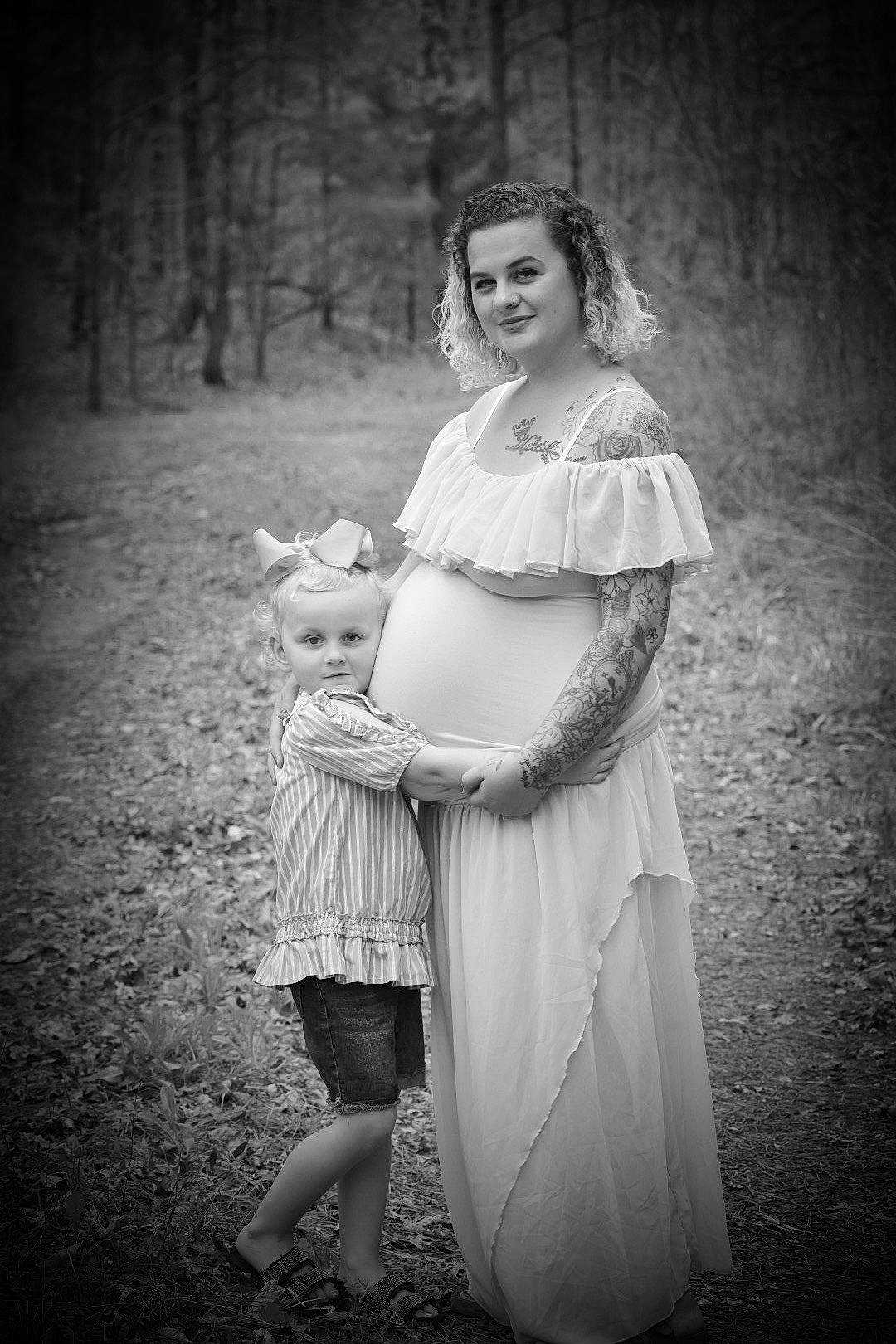 Mckenna is registered to the contest to win money with this photo: black_and_white, event, fashion_design, flash_photography, gesture, grass, happy, jewellery, joy, long_hair, monochrome, monochrome_photography, one_piece_garment, people_in_nature, person, shoulder, smile, standing, style, tints_and_shades