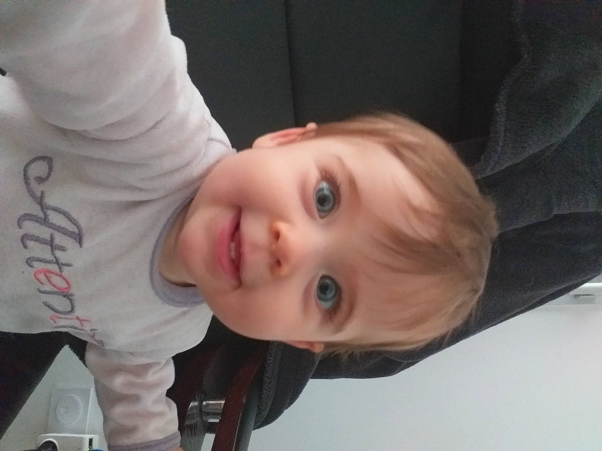 Athénais participe au concours pour gagner de l'argent avec cette photo : baby, baby_toddler_clothing, cheek, child, dress, eyebrow, eyelash, fun, happy, iris, joy, lip, mouth, nose, person, sitting, skin, sleeve, smile, suit