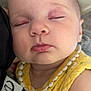 Sadie joined the competition — help win amazing prizes! baby, child, closeup, cute, eyelid, face, hand, holding, indoors, infant, peaceful, person, portrait, resting, skin, sleeping, soft_light, tender_moment, yellow_clothing, young