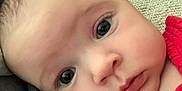 Sadie joined the competition — help win amazing prizes! baby, casual, cheeks, close_up, cute, expression, eyes, fabric, face, head, indoors, infant, person, portrait, red_clothing, resting, skin, soft, toddler, young_child