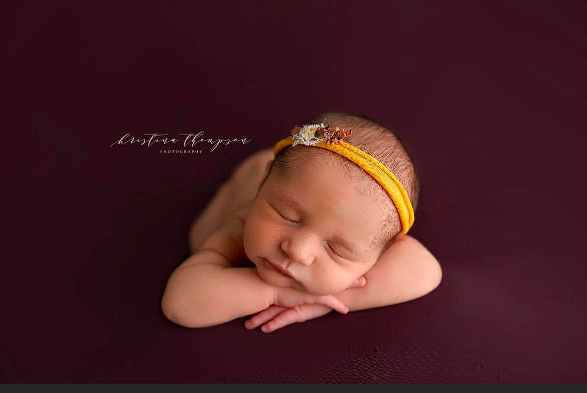 Aria Grace is registered to the contest to win money with this photo: baby, baby_sleeping, baby_toddler_clothing, beanie, cheek, child, comfort, fashion_accessory, flash_photography, fun, grass, hair_accessory, happy, headband, headgear, headpiece, linens, pattern, person, portrait_photography