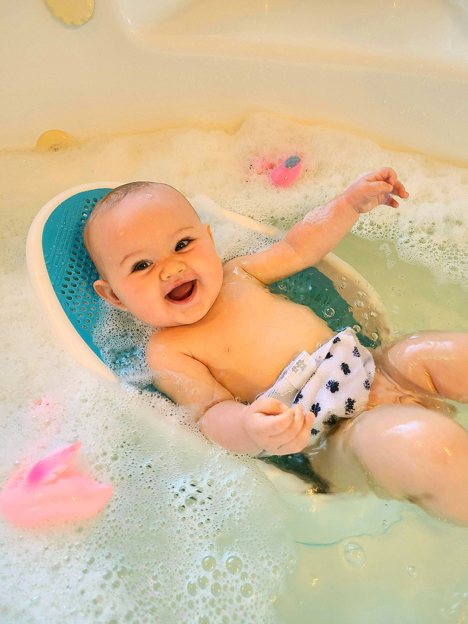 Karissa joined the competition — help win amazing prizes! aqua, baby, baby_products, bathing, chest, child, facial_expression, foam, fun, happy, hat, headgear, leisure, person, pink, play, recreation, skin, smile, toddler