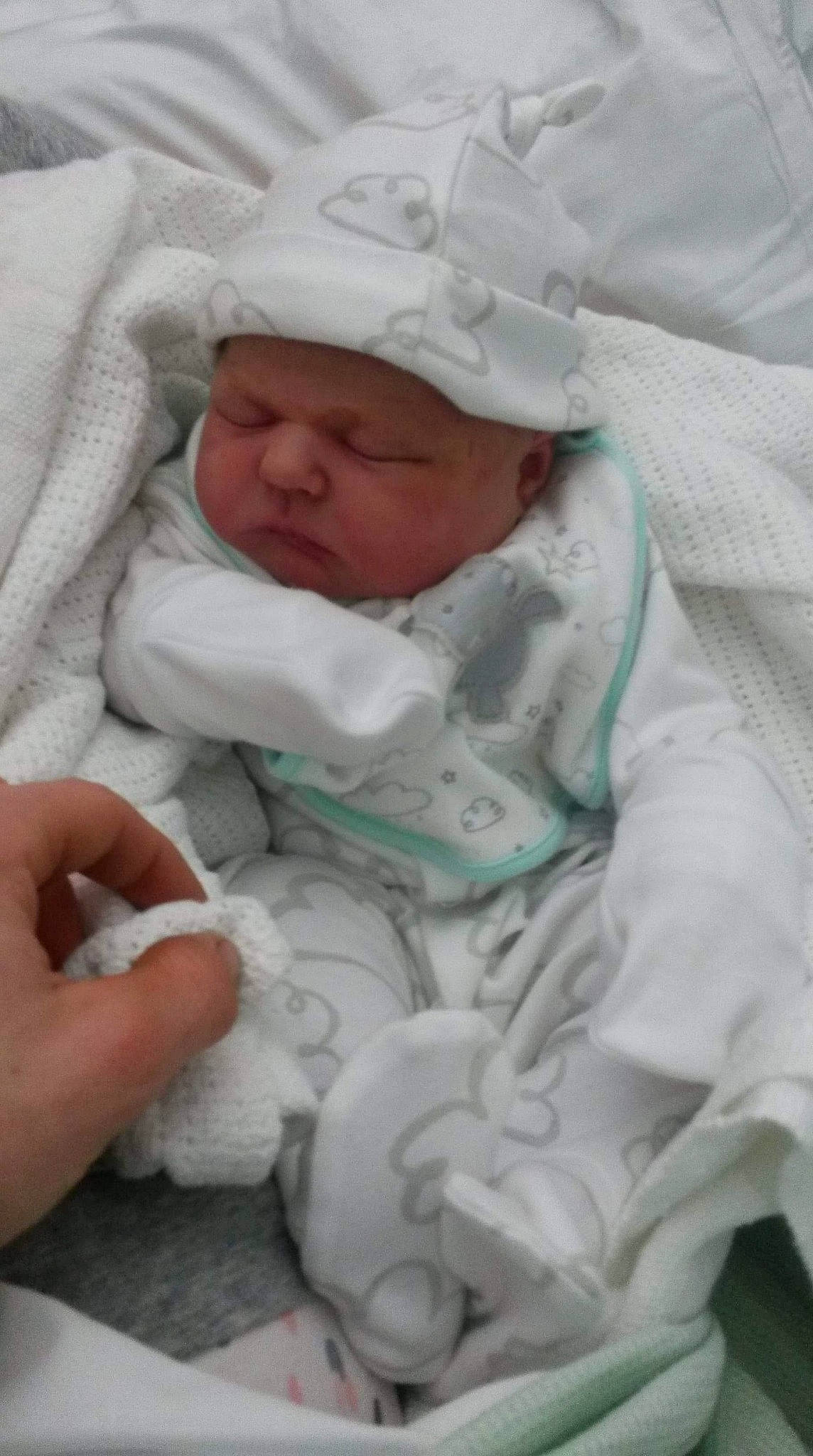 Holly is registered to the contest to win money with this photo: bed, bedtime, child, childbirth, head, headwear, infant, person, product, toddler