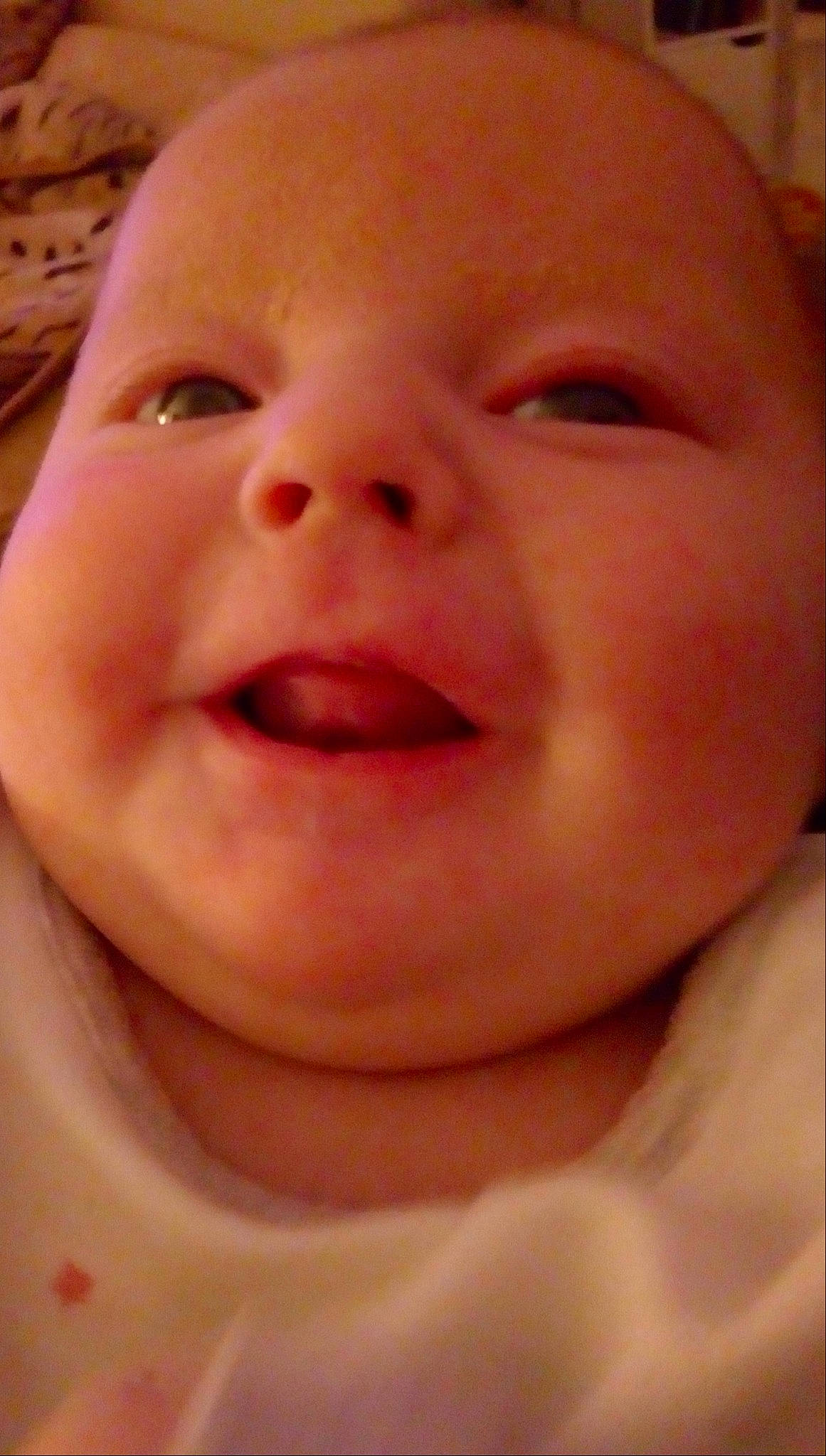 Holly is registered to the contest to win money with this photo: cheek, child, chin, close_up, ear, eyebrow, face, finger, forehead, hand, head, infant, laughter, lip, mouth, nose, person, skin, smile, tooth