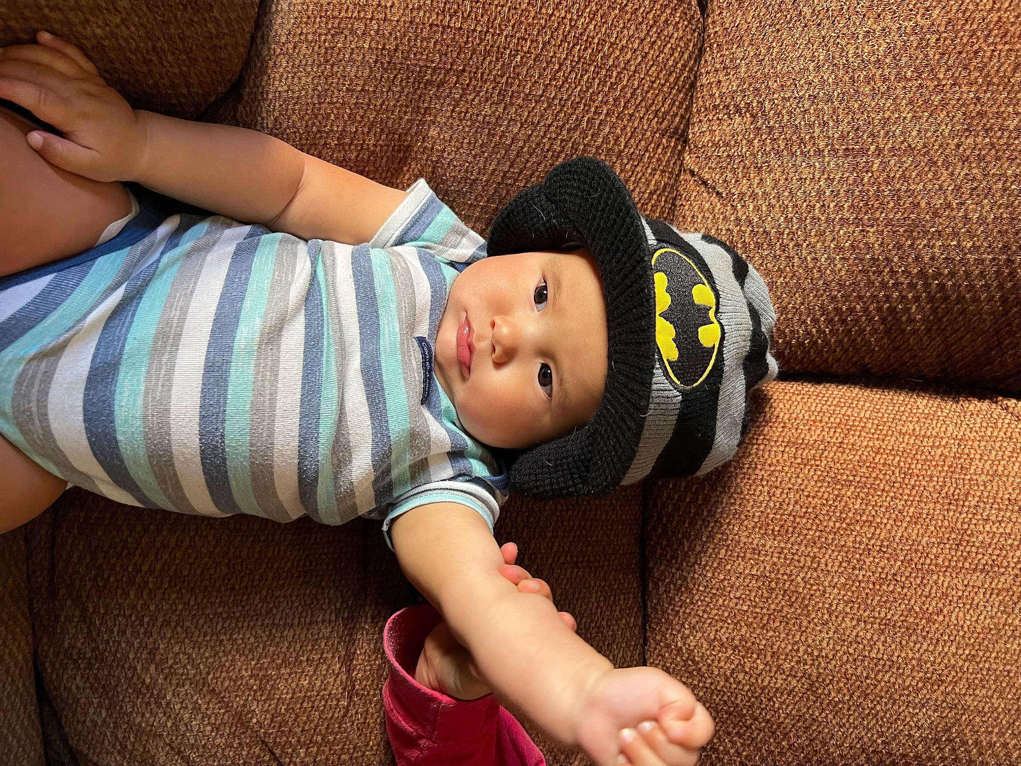 Ares joined the competition — help win amazing prizes! baby, baby_toddler_clothing, child, comfort, couch, elbow, finger, flash_photography, grass, hand, hat, headwear, human_body, linens, pattern, person, sitting, skin, sleeve, t_shirt