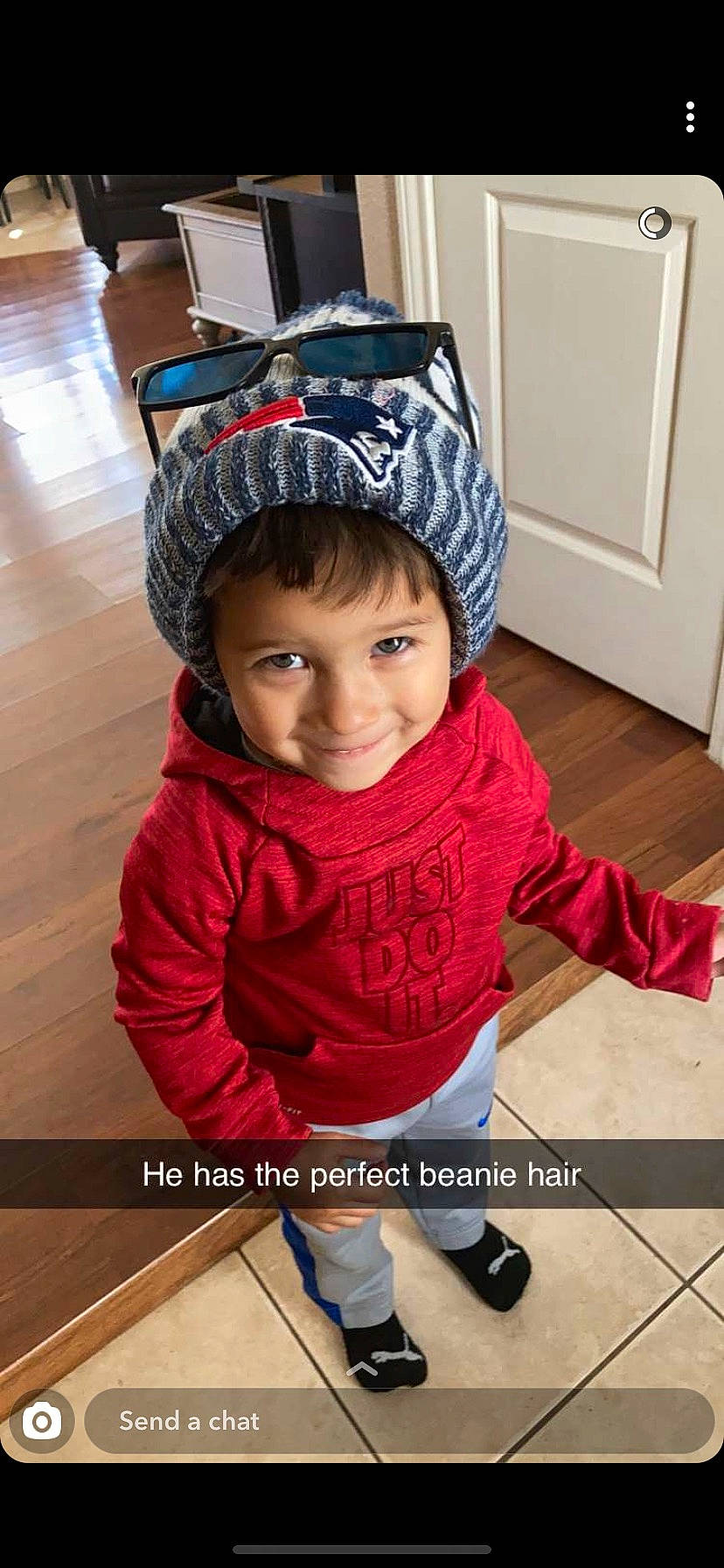 Silas joined the competition — help win amazing prizes! cap, child, cool, door, fashion_accessory, floor, flooring, happy, jacket, joy, magenta, outerwear, person, personal_protective_equipment, photograph, selfie, sitting, sleeve, smile, snapshot