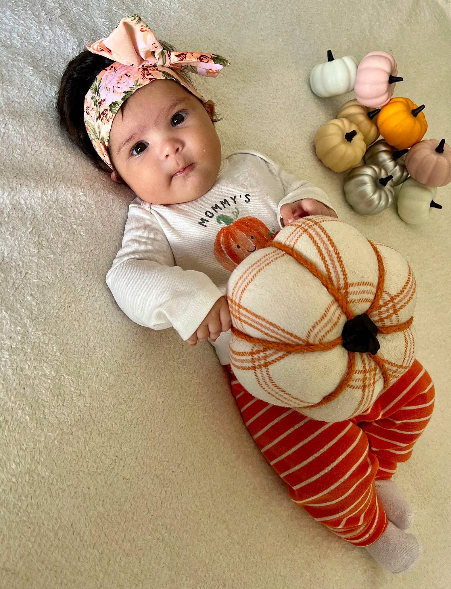 Kairie joined the competition — help win amazing prizes! baby, baby_toddler_clothing, baby_toys, calabaza, child, costume_hat, cucurbita, fashion_accessory, gourd, happy, headwear, linens, peach, person, plush, pumpkin, stuffed_toy, teddy_bear, toddler, toy