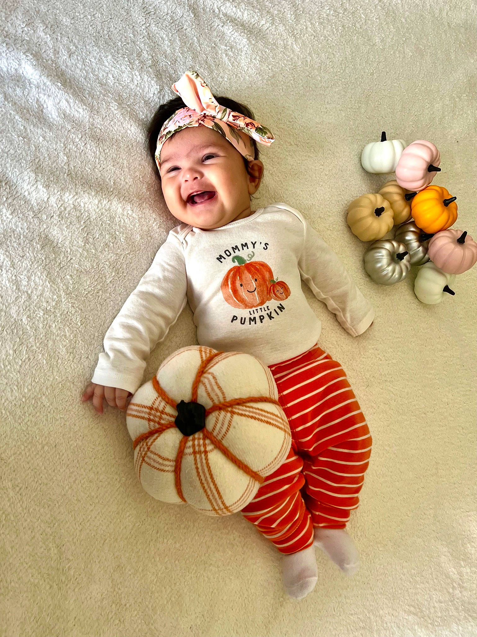Kairie joined the competition — help win amazing prizes! baby, baby_toddler_clothing, baby_toys, ball, brown, child, fashion_accessory, font, football, happy, headwear, orange, ornament, person, personal_protective_equipment, smile, sports_equipment, stuffed_toy, toddler, toy