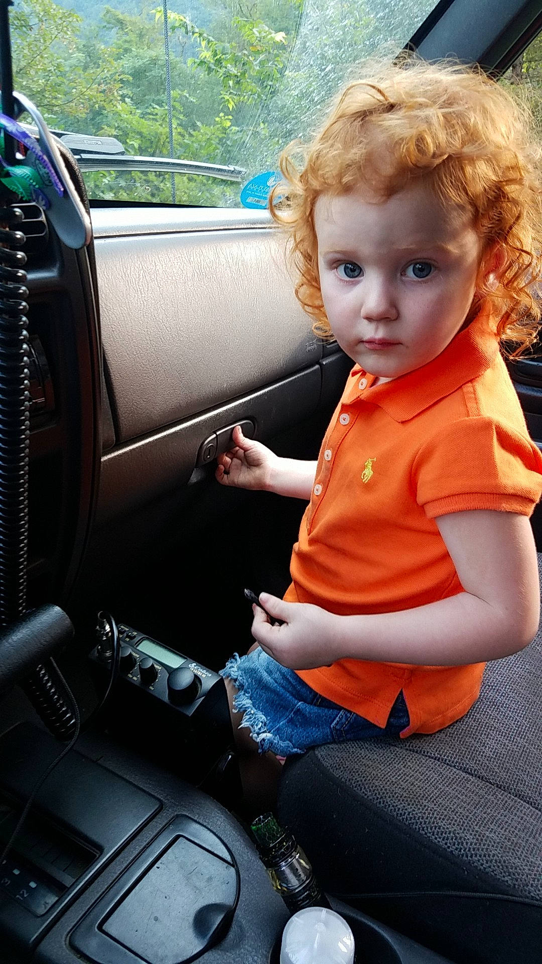 Allie is registered to the contest to win money with this photo: auto_part, blond, car, car_seat, child, child_model, driving, family_car, person, sitting, steering_part, steering_wheel, toddler, vehicle, vehicle_door