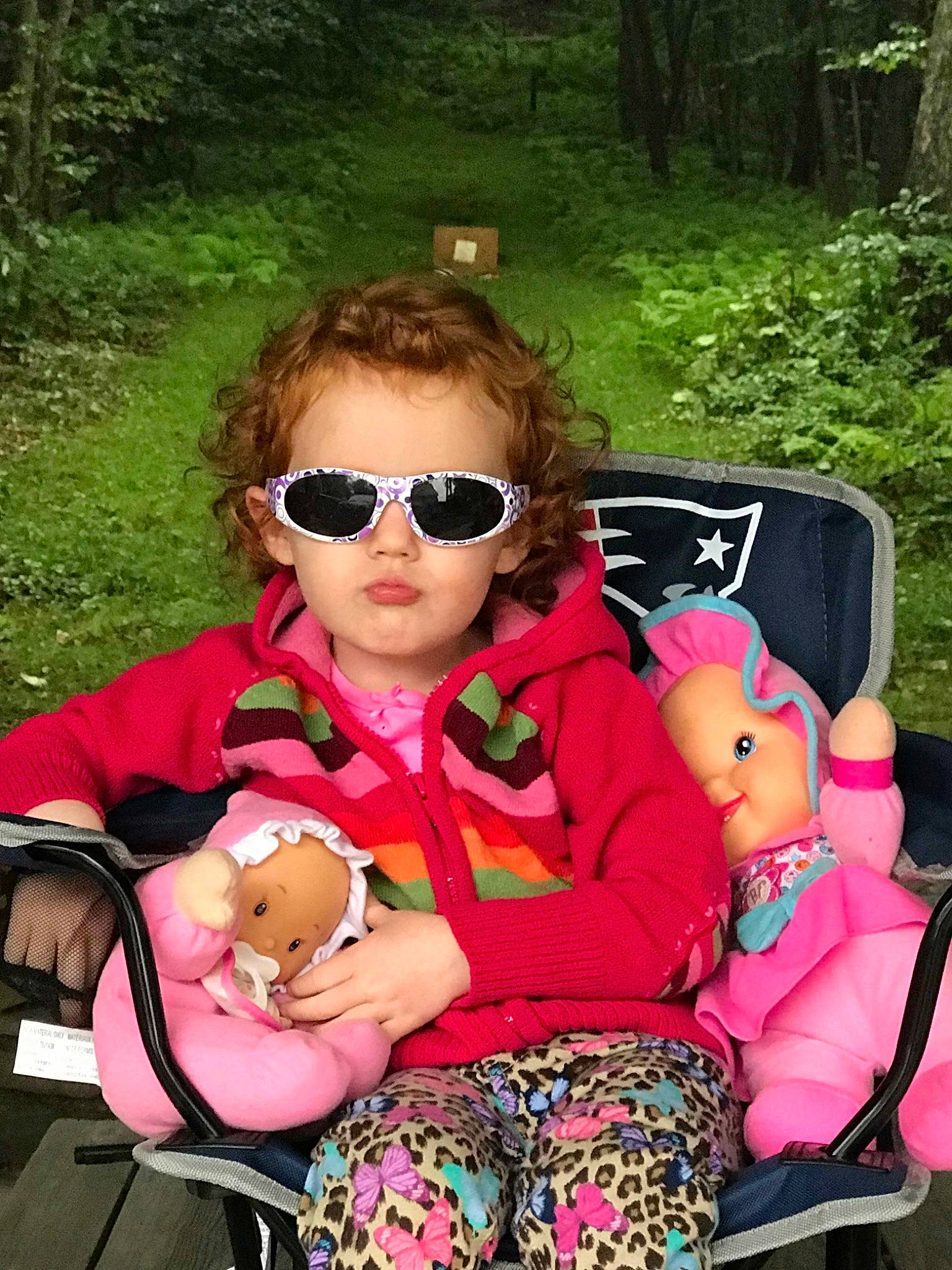 Allie joined the competition — help win amazing prizes! baby_carriage, baby_products, child, cool, eyewear, person, pink, product, sunglasses