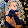 Astrid is registered to the contest to win money with this photo: animal, baby, bird, blanket, bodypart, clothing, dress, face, finger, hand, happy, head, newborn, pants, person, photography, portrait, quilt, sitting, smile
