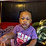 𝓣𝓪𝓶𝓪𝓻𝓪 joined the competition — help win amazing prizes! baby, child, toddler, portrait, sitting, bed, bedroom, blanket, pillow, braids, pigtails, purple_shirt, graphic_shirt, infant, face, eyes, lips, indoor, furniture, cozy