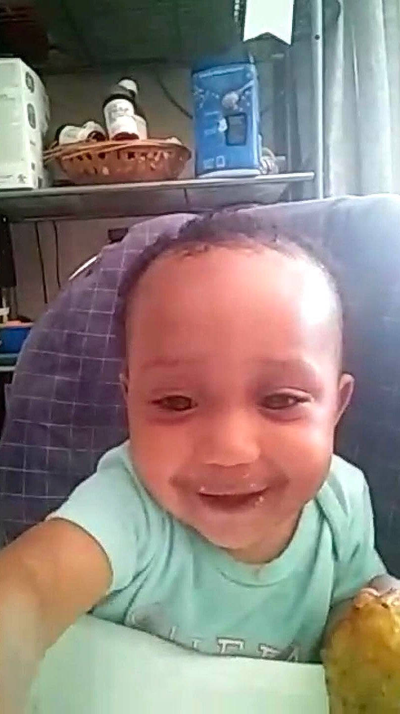 Ameila is registered to the contest to win money with this photo: baby, cheek, child, chin, ear, eating, eye, eyebrow, face, facial_expression, forehead, head, joy, laugh, lip, mouth, nose, person, skin, smile