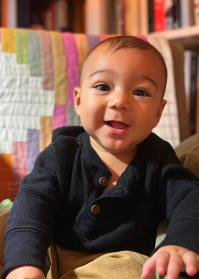 August joined the competition — help win amazing prizes! arm, baby, bookcase, cheek, chin, eye, eyebrow, face, facial_expression, finger, forehead, happy, head, human, nose, organ, person, skin, sleeve, smile