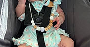 Gianna is registered to the contest to win money with this photo: accessories, baby, baseballcap, bonnet, cap, clothing, coat, costume, dress, face, glasses, hat, head, jacket, lifejacket, person, photography, portrait, shorts, sunglasses