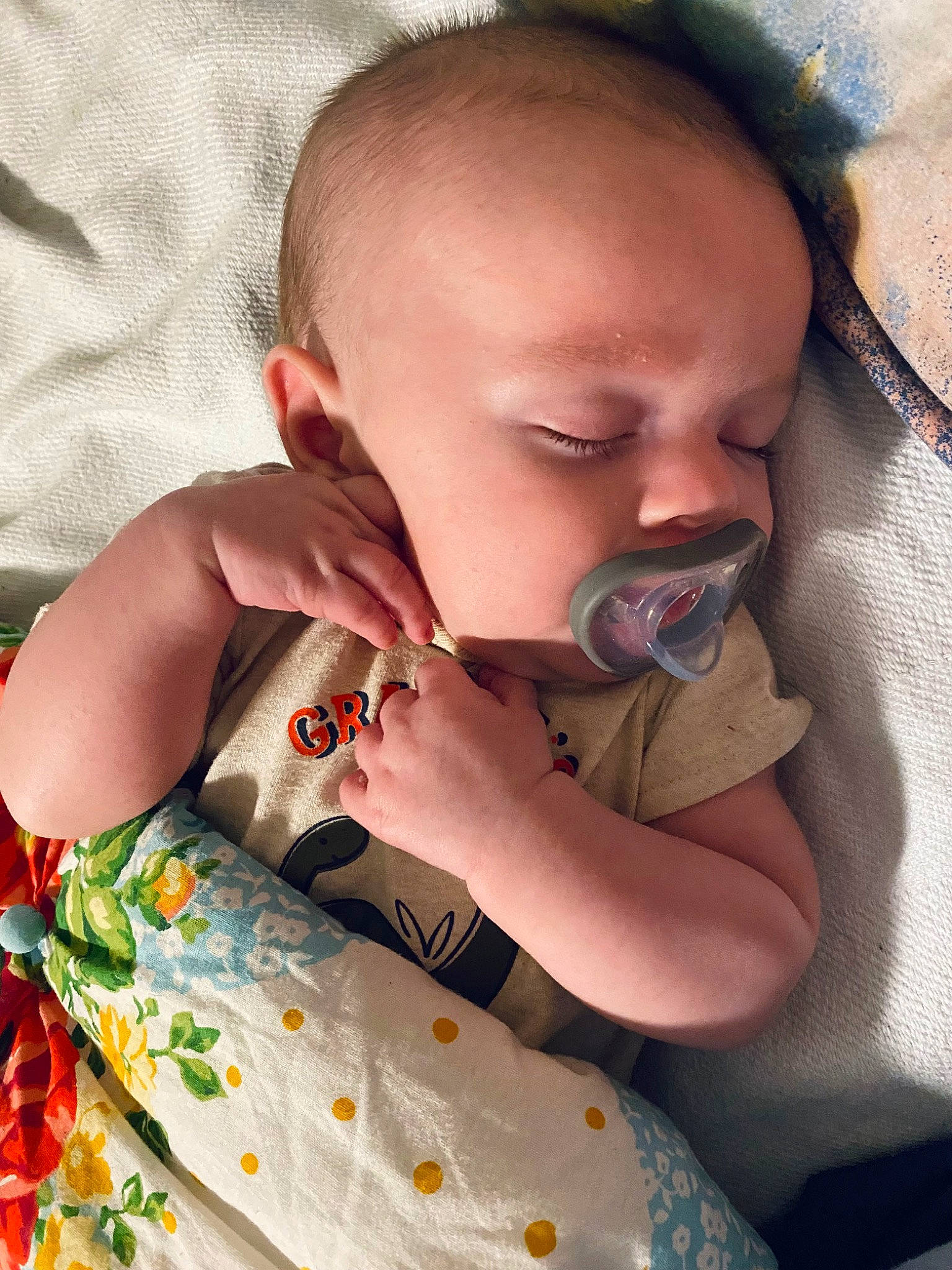 Dallas is registered to the contest to win money with this photo: baby, baby_toddler_clothing, cheek, chin, ear, eye, eyebrow, eyelash, facial_expression, hairstyle, hand, head, iris, lip, mouth, neck, nose, person, skin, sleeve