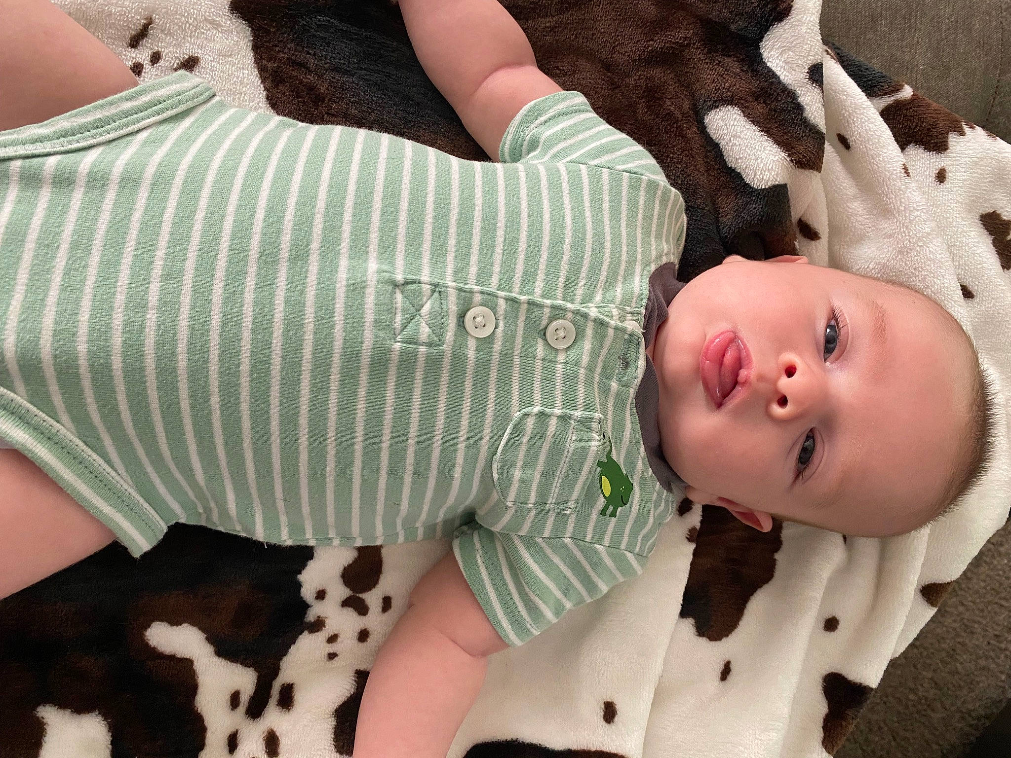 Dallas joined the competition — help win amazing prizes! arm, baby, baby_toddler_clothing, cheek, comfort, elbow, finger, gesture, hand, head, human_body, joint, leg, mammal, mouth, person, skin, sleeve, textile, thigh