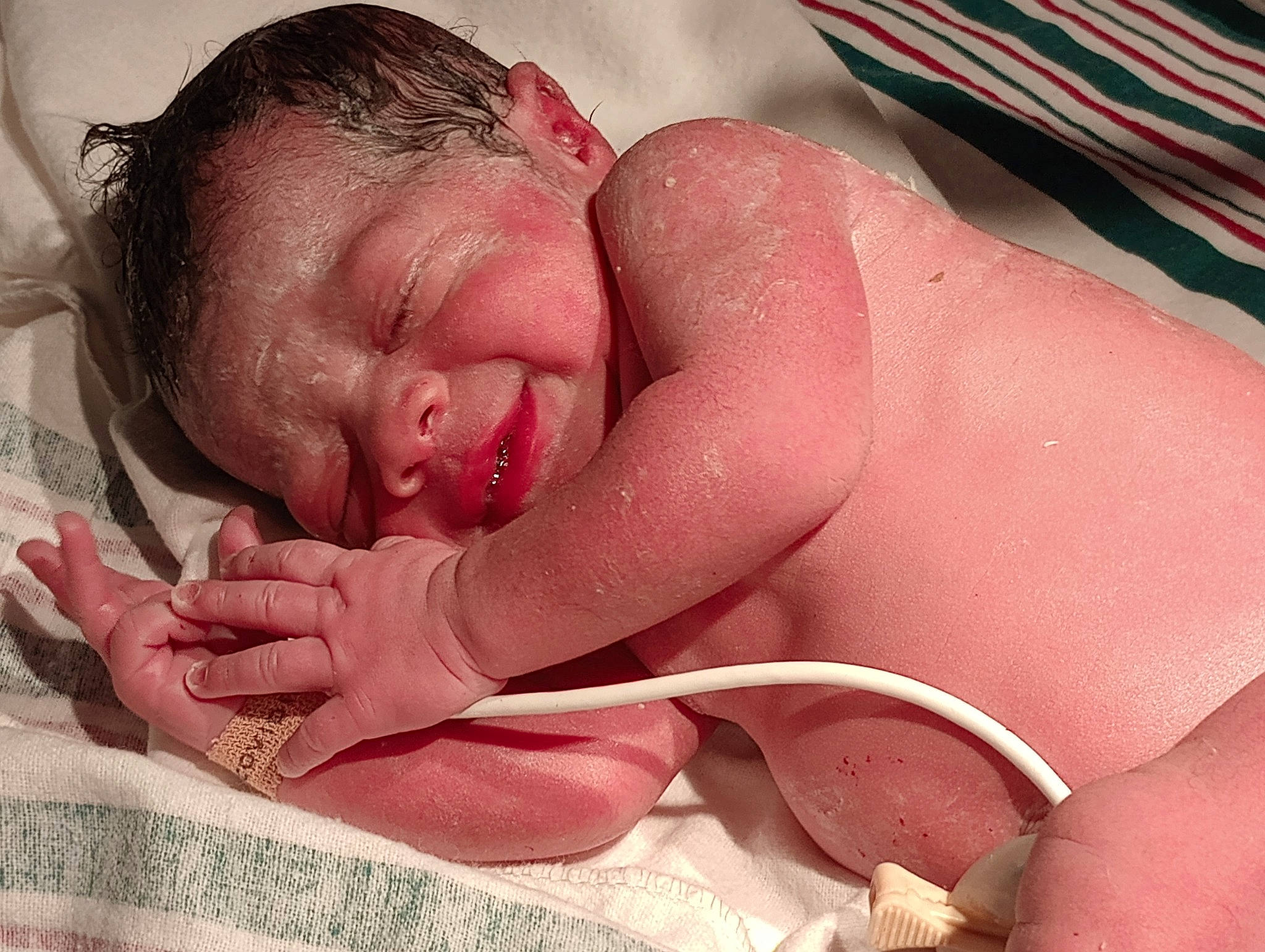 Amaya is registered to the contest to win money with this photo: baby, chest, child, comfort, finger, flesh, foot, gesture, hand, human_leg, leg, linens, mammal, mouth, nail, person, pink, skin, thumb, vertebrate