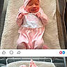 newborn, baby, pink_clothing, bow, blanket, hospital_crib, plush_toy, cute, sleeping, infant, smiling, child, peaceful, soft_lighting, portrait, indoor, person, miley, toddler, headwear