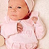 Miley joined the competition — help win amazing prizes! baby, infant, pink_clothing, headband, bow, newborn, lying_down, blanket, cute, portrait, soft_texture, small_hands, curious, child, indoors, human, sleepwear, fashion, one_person, closeup