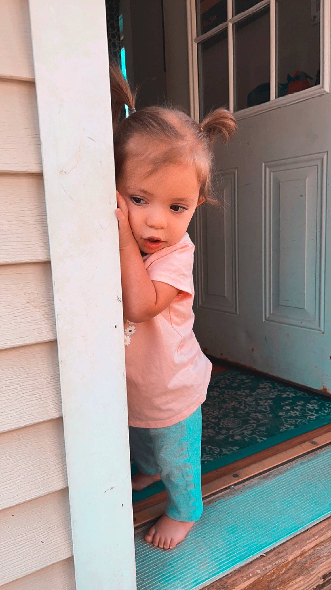 Charleigh is registered to the contest to win money with this photo: baby_toddler_clothing, child, door, floor, flooring, hair, happy, hardwood, home_door, house, leg, leisure, person, product, room, shorts, stairs, toddler, waist, wood