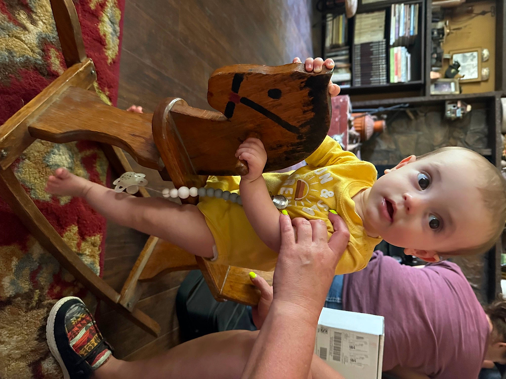 Luxton joined the competition — help win amazing prizes! baby, baby_products, child, fun, happy, leisure, mouth, nail, person, play, room, sandal, shelf, shorts, sitting, stuffed_toy, surprise, thigh, toddler, toy