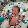 newborn, baby, hospital, incubator, medical_equipment, tubes, wires, blanket, diaper, smile, infant, premature, healthcare, monitoring, bed, cute, patient, child, nursery, care