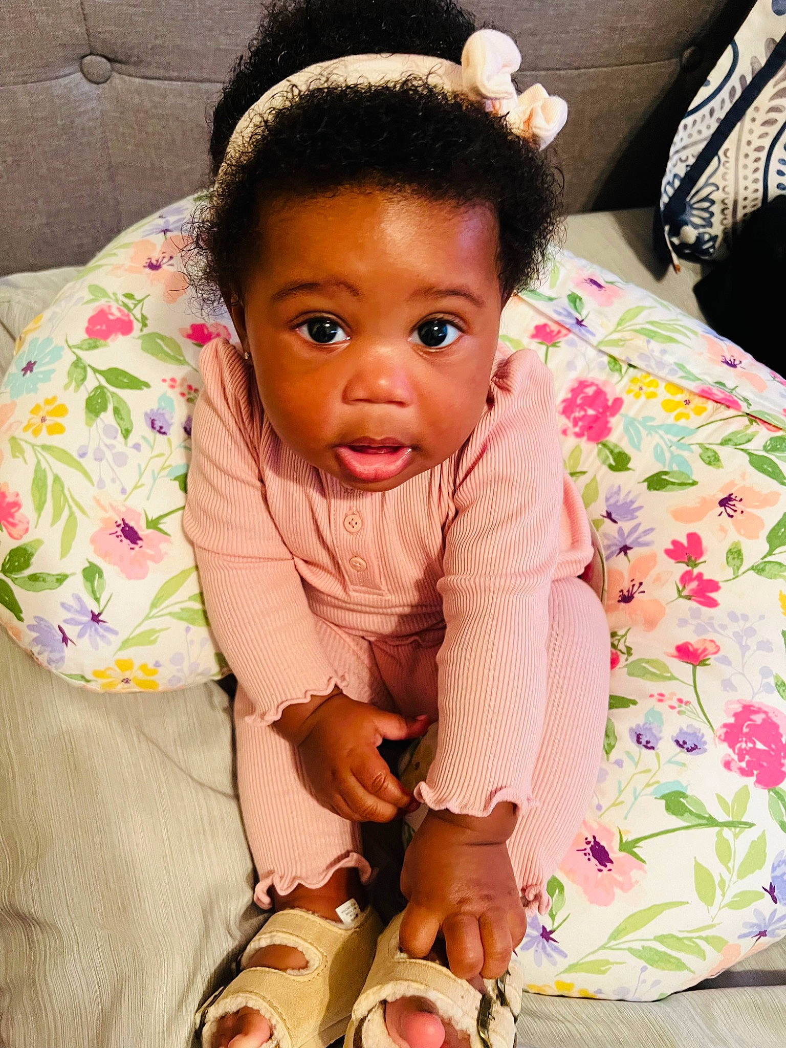 Kori is registered to the contest to win money with this photo: baby_toddler_clothing, black_hair, cheek, child, comfort, eye, eyelash, face, finger, forehead, happy, head, lip, neck, nose, person, pink, skin, sleeve, textile